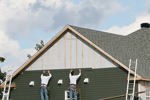 Professional Siding Replacement technician working in Bellville, OH
